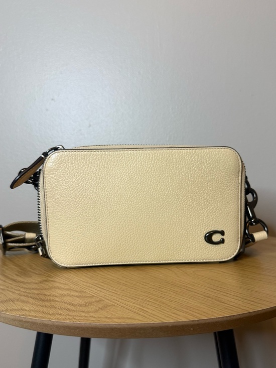 Coach Handbags - Coach Pebbled Leather Camera Crossbody in Cream with Silver Accent